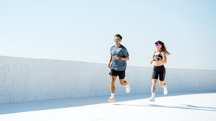 Running on a sunny day at an outdoor track
