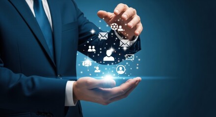 Businessman in a suit holding glowing digital network icons with his hands.