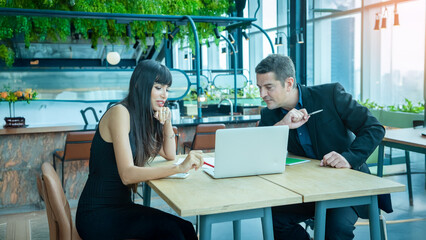 Businessman and woman are negotiating business deals, signing business contracts, celebrating business successes and partnerships, and experiencing the business world on large online platforms