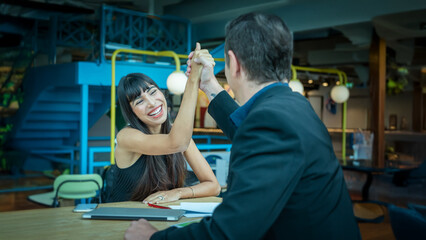 Businessman and woman are negotiating business deals, signing business contracts, celebrating business successes and partnerships, and experiencing the business world on large online platforms