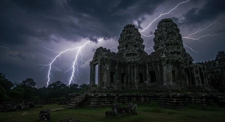 Ancient stone structure illuminated by lightning at night