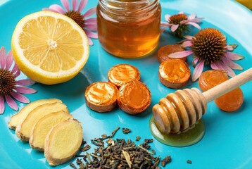 Refreshing lemon, honey, ginger, tea, and echinacea for a soothing remedy