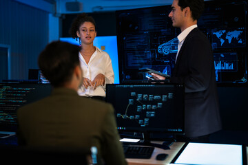 Industrial design team planning future transport strategy. Executive presenting new smart mobility concept and market trend analysis on digital board during late night workshop.