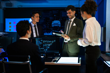 Industrial design team planning future transport strategy. Executive presenting new smart mobility concept and market trend analysis on digital board during late night workshop.