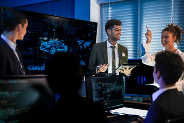 Industrial design team planning smart mobility transport. Professionals analyzing futuristic car prototype and engineering schematics on digital screens at night.