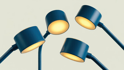 Four blue modern desk lamps with illuminated heads on a light background