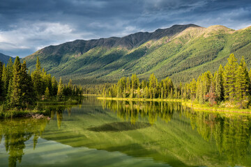Remote lake with clearing storm