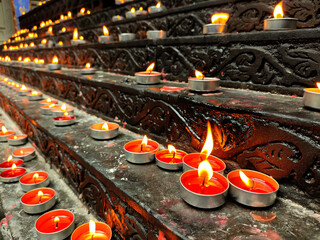 Burning candles in the Louhan Temple in Chongqing, China.