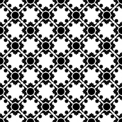 Seamless black and white geometric pattern inspired by classic tile motifs. Elegant ornamental design ideal for textiles, fashion fabrics, interior decoration, wallpapers, and surface design projects.