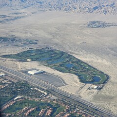 aerial view of golf course in the desert