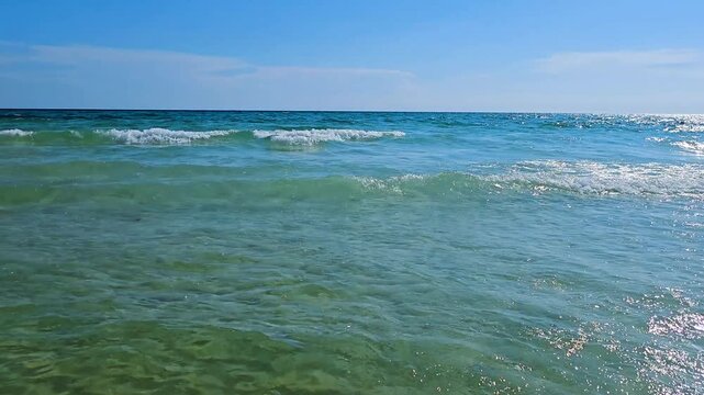 Small Ocean Waves on a Sunny Summer Day