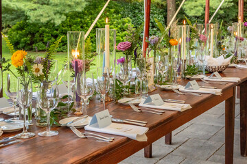 Farm table set for an elegant wedding  © Jim