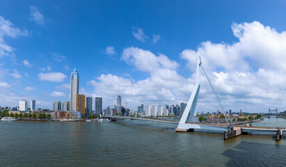 Panoramic view of Erasmus Erasmusbrug bridge in Rotterdam. Financial business district skyline.