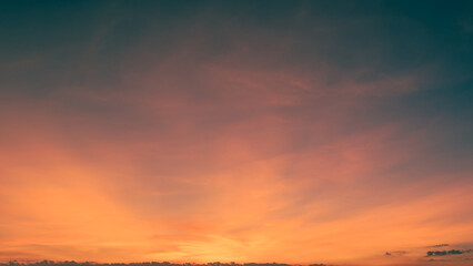 Dusk, Sky dark blue sun dawn Background, Evening sunset sky clouds with orange, yellow color sunlight, Colorful sunrise horizon landscape blur hour