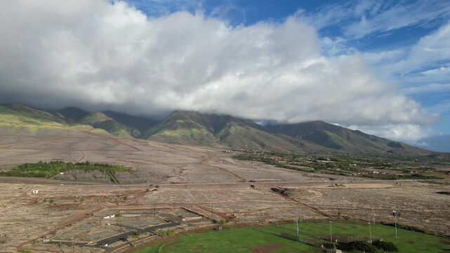 west maui mountains in lahaina hawaii (tropical pacific island territory) scenic view bare hills green mountain landscape aerial view clouds moving usa last state united states of america forest