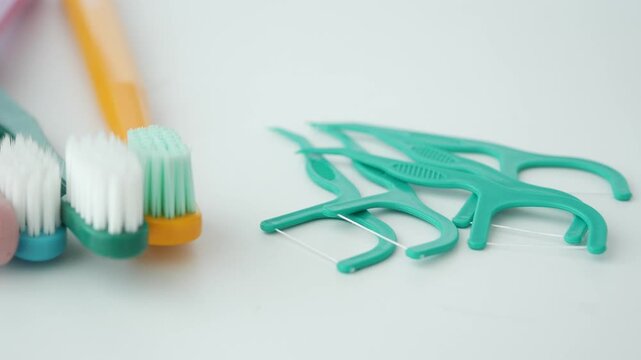 Using dental floss picks for oral care