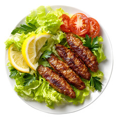 Grilled meat patties on fresh lettuce with lemon, parsley, cucumber, tomato, and olive garnish, Mediterranean cuisine on white plate, top view