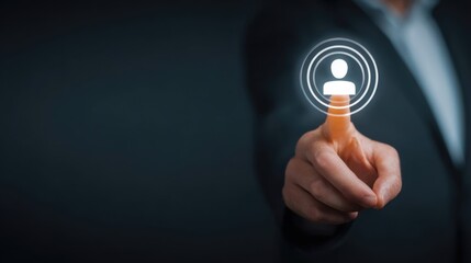 Businessman touching user icon with finger. Digital interface and technology concept with glowing human symbol.