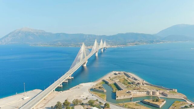 Patras, Greece. Rio Fortress. The Rio-Antirrio Bridge. Officially the Charilaos Trikoupis Bridge. Bridge over the Gulf of Corinth (Strait of Rion and Andirion). Drone footage
