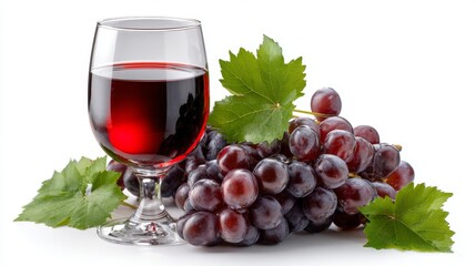 Glass of red wine with fresh purple grapes and green leaves isolated on white background.