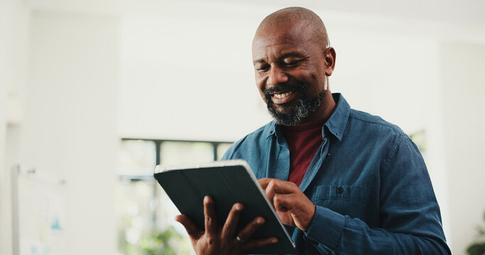 Web designer, happy man or reading on tablet in home for remote work, plan or check homepage features. Project proposal, freelancer or mature black person with site update idea, review domain or tech