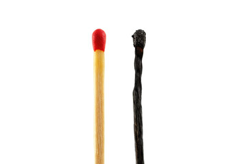 Pristine unlit red matchstick juxtaposed with a burnt-out charred one on a white background. Concept of burnout, exhaustion and contrast