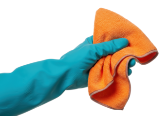 Hand in a turquoise rubber glove gripping an orange microfiber cloth on a white background with copy space. Concept of professional cleaning and hygiene