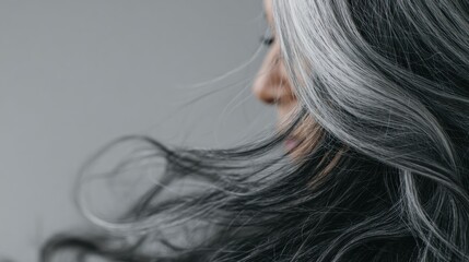 Naklejka premium Transformation From Dull Gray Hair to Vibrant Brunette With Shine and Volume, Showcasing Playful Hair Movement for Color Promotion