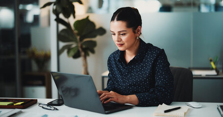 Business woman, accountant or typing with laptop for finance audit, checklist or expenses in office. Female person, accounting or financial planning with computer or notes for company budget or bills