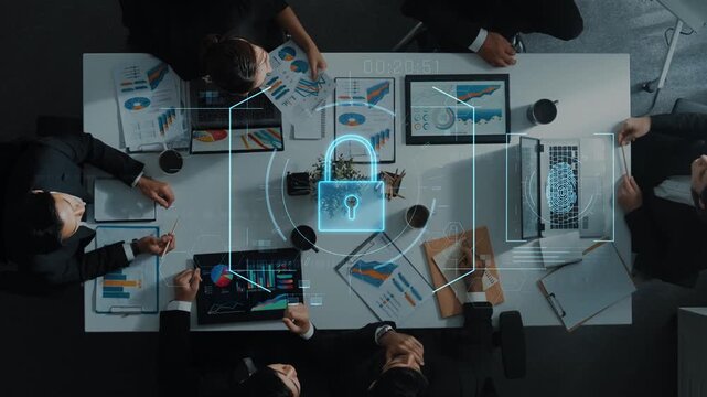 An aerial view captures a business meeting focused on data security, featuring a digital lock symbol on the table, highlighting the importance of protecting information in corporate settings. Raster