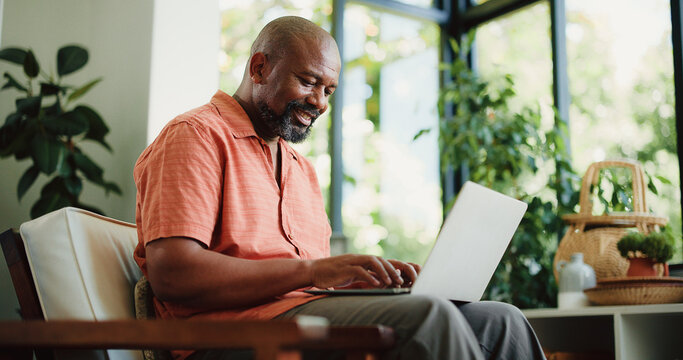 Remote work, typing or black man in house with laptop, lead update or edit of news article. Freelancer, mature person or journalist in home with technology, fact check or source contact on email.