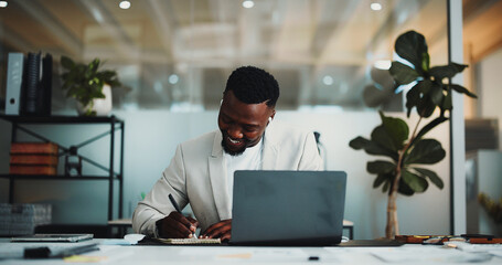 Writing, laptop and research with business black man in office for planning, account review and...