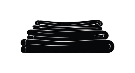 A neatly folded pile of dark towels presented in a striking black and white silhouette © Kuntol02
