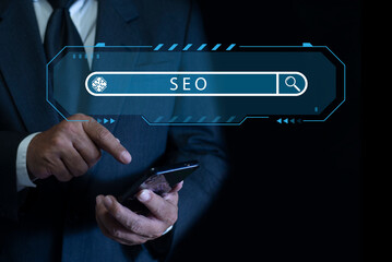 Businessman using smartphone with AI-powered SEO search engine optimization tool. Search Engine Optimization SEO Networking Concept.