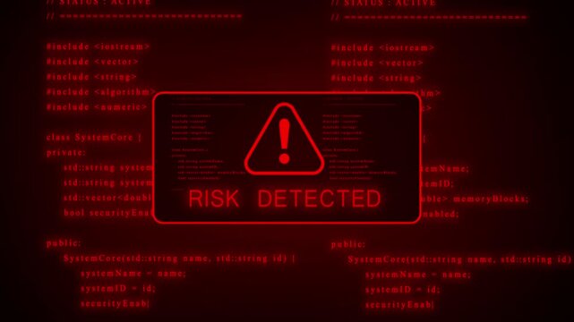Red digital screen displaying computer code with a warning triangle symbol and glitch effects indicating a system error or alert in a dark technological environment with red hues