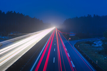 Long Exposure Traffic on a Night Highway with Light Trails