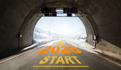 A road emerging from a tunnel between snow-covered mountains bore the inscription ‘2027 START’. An inspiring concept symbolizing the beginning of the new year and its goals.