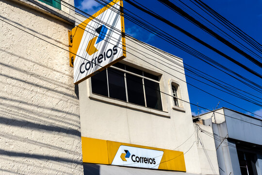 Sao Paulo, Brazil, January 06, 2026. Facade of a Correios (Brazilian Post Office) agency in city. This image portrays a typical urban scene with its characteristic overhead power lines