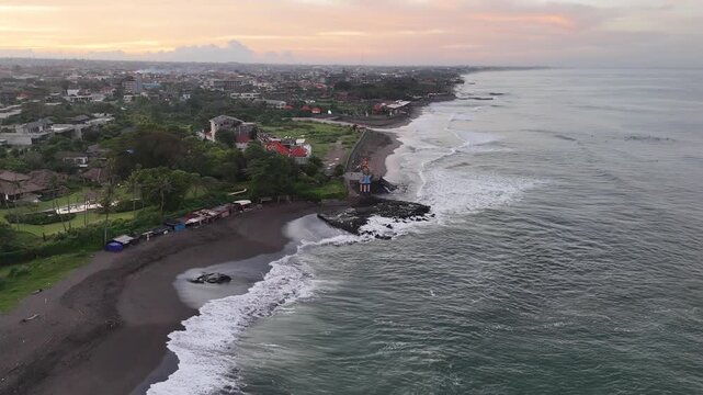 Bali beach called Prerenan north of Canggu I have recorded this drone footage at first sunlight at 5am, waiting for the sun to come up over the horizon, hitting all the notes from pink to orange, whil