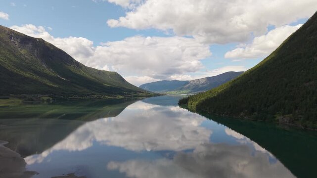 Otta River Flowing Through The Scenic Ottadalen Valley Near Lom, Norway. Wide Shot