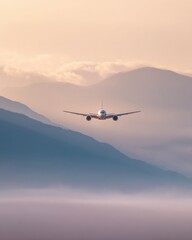 Inspiring Passenger Plane Soaring Above Tranquil Foggy Mountains Premium Travel Marketing Content for Lofty Ambitions