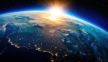 Stunning view of Earth from space with sunrise over horizon.