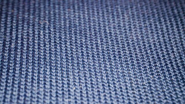 Macro footage of Blue Elastic Fabric texture. A close-up of intricately woven Blue Elastic Fabric, showcasing the delicate strands and textures that blend seamlessly to form a vibrant textile. 