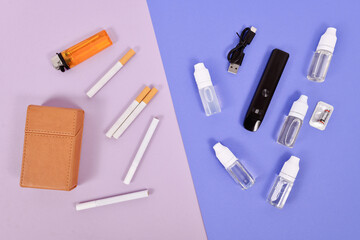 Comparison between electronic and real cigarette with tools on two-colored background