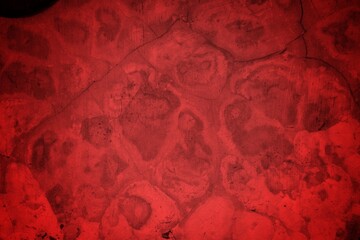Cracked Red Wall Texture With Deep Fissures And Subtle Shadows For Background Design