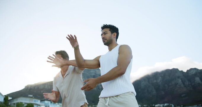 Men, tai chi and martial art with lesson for balance, practice or motion meditation in nature. Male people, kung fu and flare with slow movement, flexibility or control for mindfulness, chakra or Qi