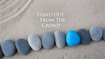 One Blue Stone Stands Out In A Row Of Many