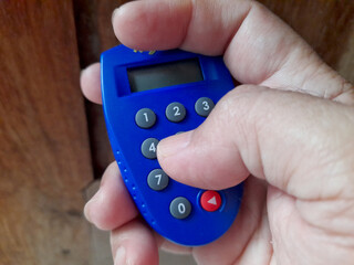 Hand Holding Blue Digital Security Token