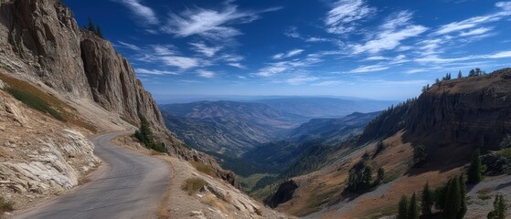 Winding mountain road through dramatic rocky landscape