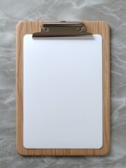 Blank clipboard on a marble background